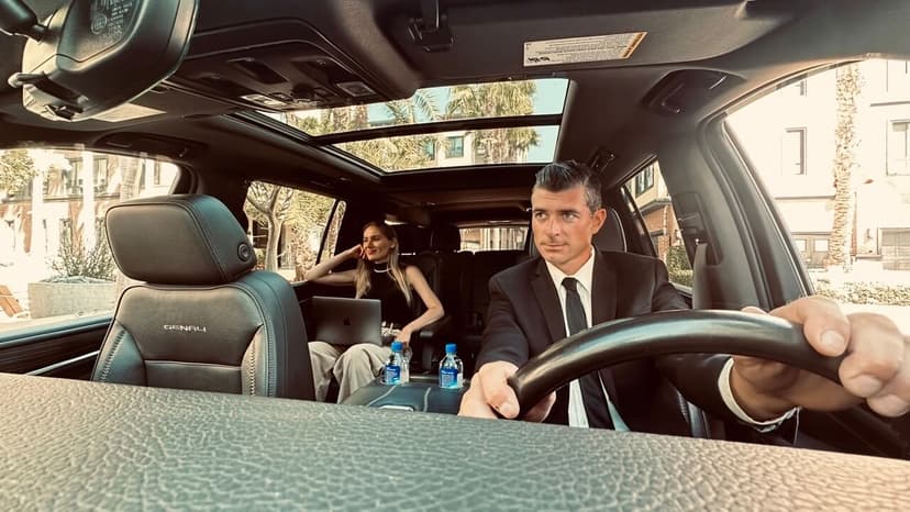 LAXcar chauffeur taking a passenger to her destination LAXcar chauffeur taking a passenger to her destination