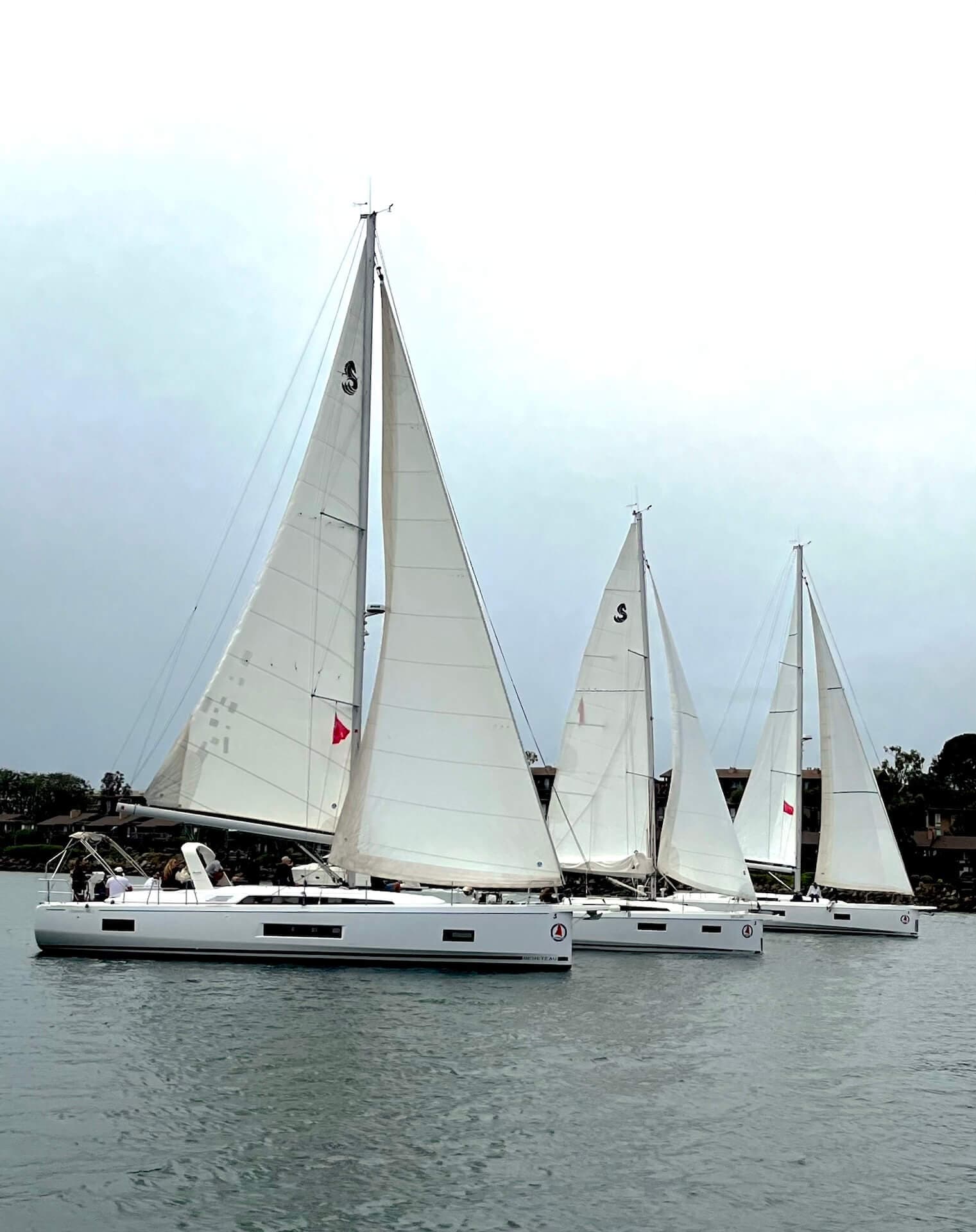 naos 15 year anniversary three boats on water