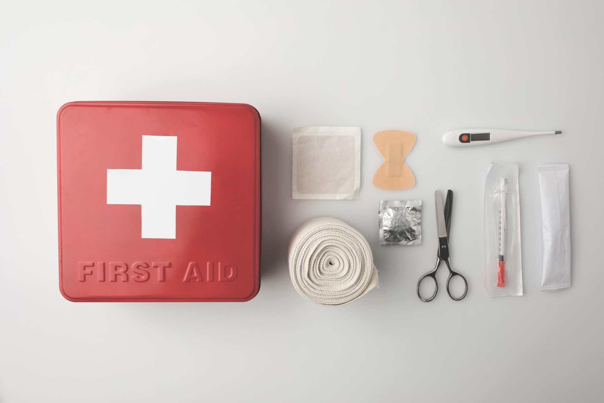 top view of first aid kit with patch scissors