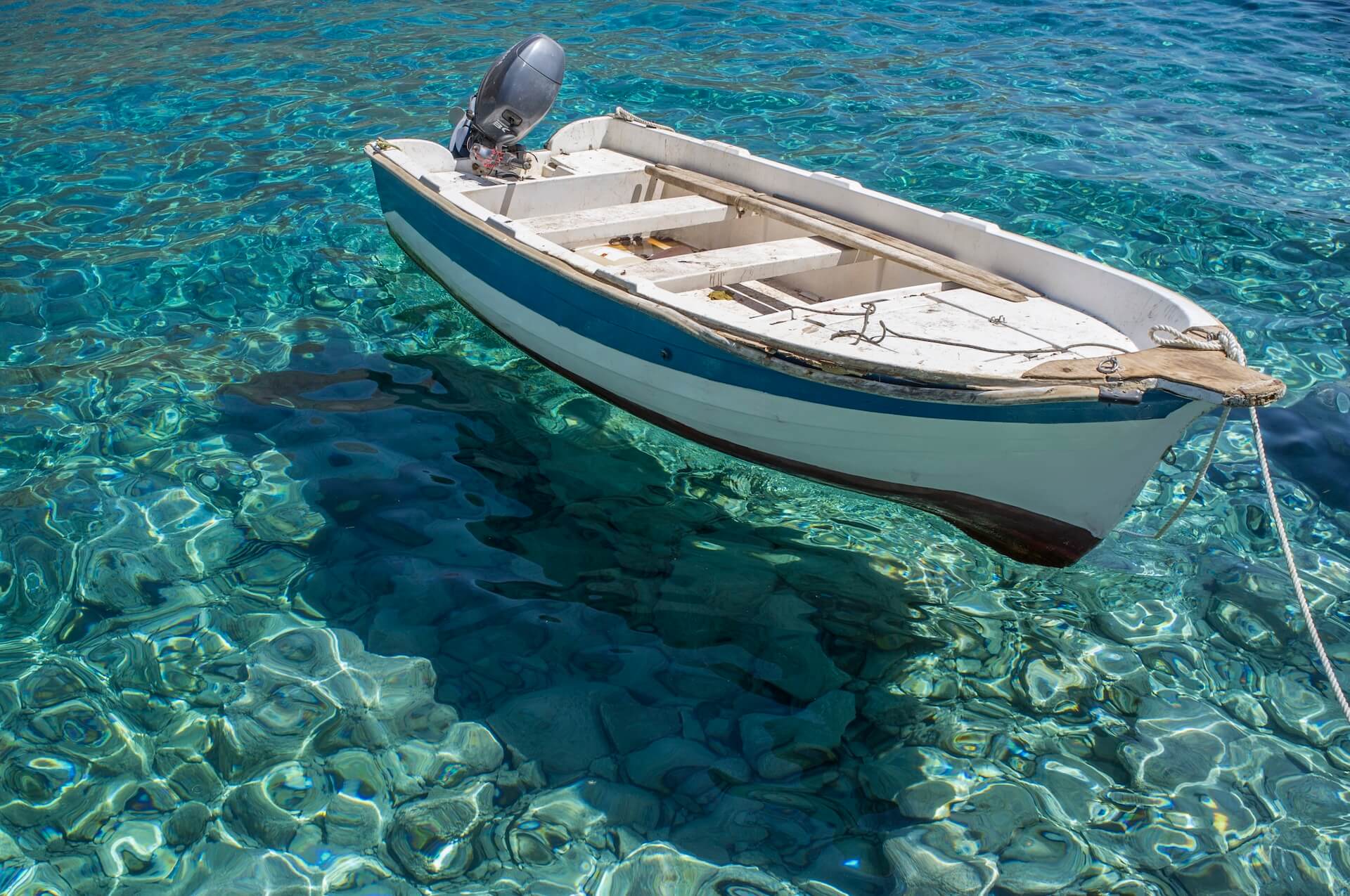 boat in clear water loutro crete